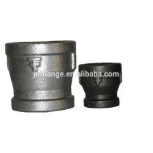 Malleable iron reducing coupling